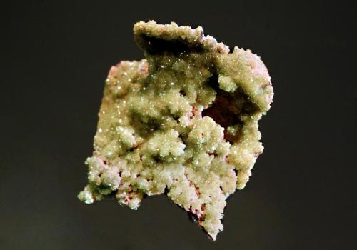 Smithsonite ps. cerussite
Tsumeb Mine, Tsumeb, Namibia
4.3 x 4.6 cm.
Drusy green cuprian smithsonite replacing cerussite with pink dolomite and colorless calcite on the reverse side. (Author: crosstimber)