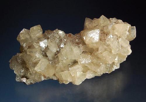 Smithsonite
Tsumeb Mine, Tsumeb, Namibia
4.0 x 7.8 cm.
Pale tan rhombs of smithsonite to 1.2 cm. (Author: crosstimber)