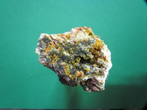 Mimetite, Wulfenite
Chah Milleh Mine (Chah Mileh Mine; Tchah-Mille Mine), Chah Milleh (Chah-Mileh; Tchah-Mille), Anarak District, Nain County (Nayin County), Esfahan Province (Isfahan Province; Aspadana Province), Iran
10 * 15 cm
This specimen consists of bright orange mimetite of the best color. All in all, this is a beautiful specimen of material that is very, very difficult to obtain (Author: h.abbasi)