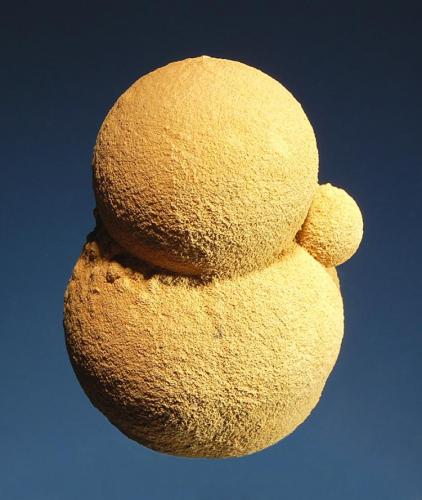 Siderite
Nikolaevskiy Mine, Dal’negorsk, Primorskiy Kray, Russia
4.2 x 5.7 cm.
Tan spheres of siderite that look like they are undergoing mitosis. (Author: crosstimber)