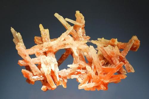 Quartz
Vtoroy Sovietskiy mIne, Dal’negorsk, Primorskiy Kary, Russia
9.0 x 12.0 cm.
A jackstraw group of slender orange quartz crystals partially coated with a second generation of colorless quartz from the find in 1996. (Author: crosstimber)