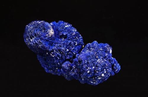 Azurite
Los Olivos Mine, Chihuahua, Mexico
2.8 x 5.9 cm.
Dennis Beals, the proprietor of XTAL, had a small batch of these attractive azurites from a mine that I’d never heard of. The location is listed on Mindat along with a couple of azurite photos, so although the location is not entirely new, I’m hoping that the current batch represents good things to come from there in the future. (Author: crosstimber)
