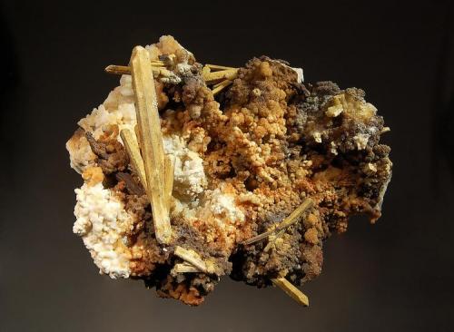 Stibiconite ps. after stibnite
La Bufa Mine, Catorce, San Luis Potosi, Mexico
7.8 x 9.0 cm.
Prismatic crystals of stibnite replaced by yellowish-tan stibiconite on a quartz matrix. (Author: crosstimber)