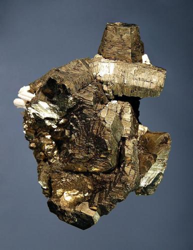 Pyrrhotite
El Potosi Mine, Mun. de Aquiles Serdan, Santa Eulalia Dist., Chihuahua, Mexico
5.0 x 6.5 cm.
Bright brassy metallic floater group of stacked pseudohexagonal crystals 
to 4.0 cm with minor white quartz. (Author: crosstimber)