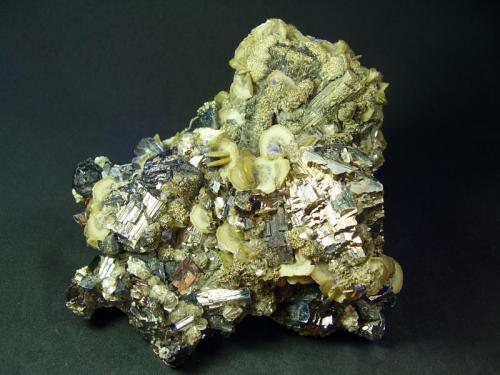 Arsenopirita-Pirita-Siderita-Fluorita-Apatito-Ferberita
Mina Panasqueira, Covilha, Portugal
11´5x10 (Autor: geoalfon)