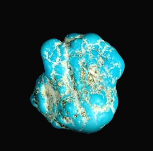 Turquesa
Sleeping Beauty Mine, Miami, Gila Co., Arizona, EUA.
2,9 x 2,5 x 2,3 cm. /  peso= 19,1 gr.
Nódulo botrioidal, azul celeste, con pirita. (Autor: Carles Curto)