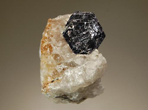 Molybdenite
Moly Hill Mine, La Motte, Abitibi RCM, Quebec, Canada
4.0 x 4.5 cm.
Lustrous metallic molybdenite crystal measuring 2.0 cm across on a massive quartz matrix. (Author: crosstimber)