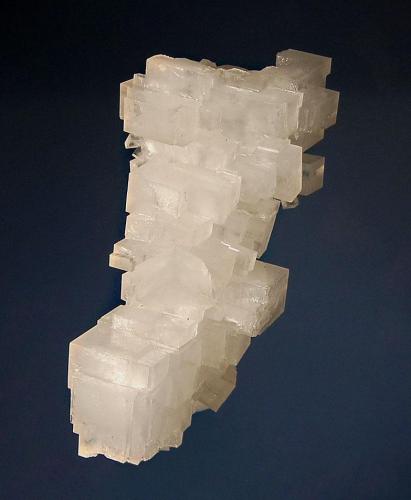 Halite
PCS Mine, Rocanville, Saskatchewan, Canada
3.5 x 8.5 cm.
Colorless cubes of halite crystallized in a stairstep aggregate. (Author: crosstimber)
