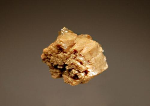 Whiteite
Cross Cut Creek, Dawson District, Yukon Territory, Canada
1.5 x 2.0 cm.
Doubly terminated, light brown whiteite crystal with minor quartz. (Author: crosstimber)