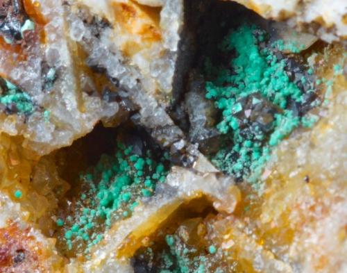 Philipsburgite on quartz (ex Ralph Sutcliffe).
Driggith Mine, Caldbeck Fells, Cumbria, UK.
Field of view is 15 mm, specimen is 55 mm. (Author: Ru Smith)