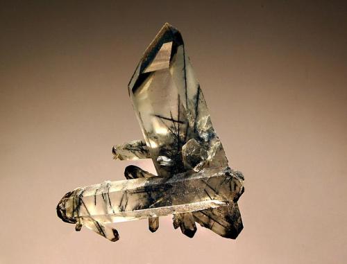 Quartz included with elbaite
Artur Mine, Jaguaracu, Minas Gerais, Brazil
4.6 x 5.0 cm.
Transparent quartz crystals included with what I thought was schorl when I acquired this specimen.  However, the inclusions are definitely green in strongly transmitted light. (Author: crosstimber)