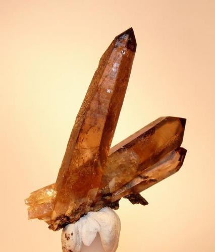 Smoky Quartz, Aegerine and unknown mineral.
Mt. Malosa, Zomba, Malawi
43 x 31 x 22 mm
The longest crystal has needle like inclusions, similar to rutile. (Author: Pierre Joubert)