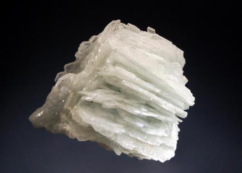 Albite var. cleavelandite
Governador Valadares, Minas Gerais, Brazil
7.0 x 7.5 cm.
Bladed pale blue albite crystals. (Author: crosstimber)