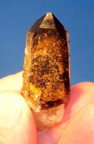 Smoky quartz
Mount Malosa, Zomba, Malawi.
44 x 17 x 12 mm
Smoky quartz with a variety of mineral inclusions. (Author: Pierre Joubert)