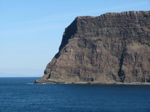 Oisgill Bay, Isle of Skye, Scotland
The north end of Oisgill bay. An Ceannaich is the cliff around the corner. The cliffs are 600 feet (190m) high and scary / awe-inspiring !
Photo taken Easter 2013. (Author: Mike Wood)