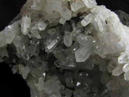 Quartz
Sgurr nan Cearcall, nr Glen Brittle, Isle of Skye, Scotland, UK
FOV 5cm x 4cm approx.
Close-up of the large quartz specimen showing detail of the crystals. (Author: Mike Wood)