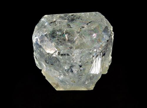 Topaz
Machacalis, Minas Gerais, Brazil
3.0 x 3.5 cm.
Single, pale blue, glassy topaz crystal with a pinacoid termination and pyramidal modifications. (Author: crosstimber)