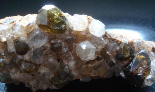 Andradite variety Demantoid
Antetezambato, Ambanja, Antsiranana, Madagascar
9,8 x 4,0 x 3,0 cm 
crystals ~2,0 X 1,5 x 0,8  & ~1,0 x 1,7 x 1,2 cm (Author: Jacquou HO)