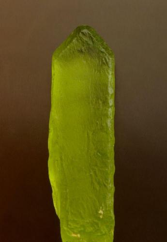 Olivine Group (variety peridot)
Pyaung Gaung mine, Bernardmyo village, north of Mogok, Burma (Myanmar).
22 mm long. (Author: Ru Smith)