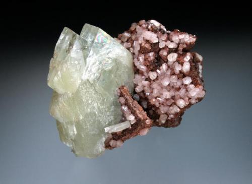 Barite with Calcite and Hematite
Frizington, Cumbria, England, UK
6x6x5 cm
Barite with calcite and hematite from an unrecorded mine in the Frizington area, West Cumbria. Likely recovered prior to 1890. (Author: Jesse Fisher)