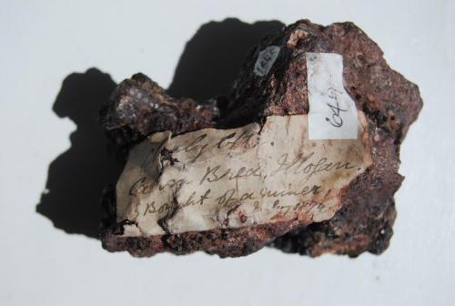 Siderite
Carn Brea Mine, Illogan, Cornwall, England, United Kingdom.
Detail of attached label. (Author: Edelmin)