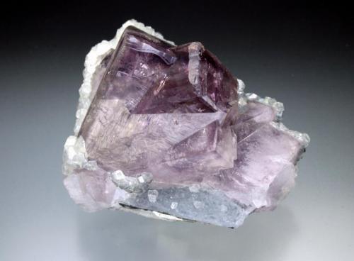 Fluorite with Calcite and Quartz
Rotherhope Fell Mine, Alston Moor, Cumbria, England, UK
7 cm across (Author: Jesse Fisher)