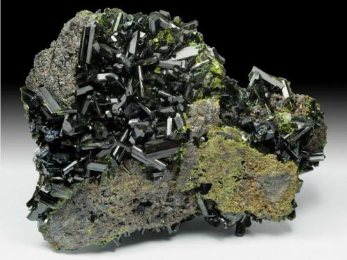 Epidote
Khowrin Mount, Kohandan (East of Tafresh), central Iran
The length of largest crystal in upper left is 1cm. (Author: vhairap)