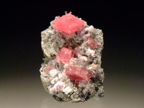 Rhodochrosite with fluorite, pyrite & apatite
Nates Pocket, Sweet Home Mine, Alma, Colorado, USA
4.5x3.3cm
This is my honeymoon rock, our honeymoon just happened to coincide with the Australian Gemboree :) (Author: Greg Lilly)