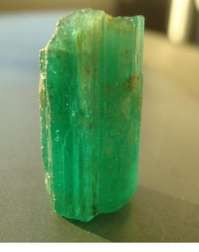 Beryl (var. Emerald)
Wolo, Ethiopia
2,5 x 1,2 x 1,2 cm
Emerald in sunlight (Author: Jacquou HO)