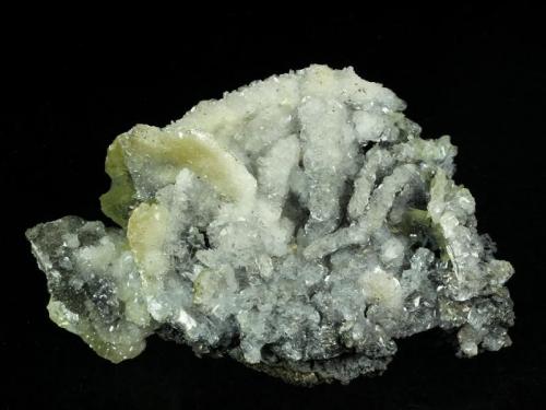 Wulfenite altering to Descloizite with Calcite
Glove Mine, Tyndall District, near Amado, Santa Cruz County, Arizona, USA
72 x 49 x 36 mm
up to 42 mm Wulfenites (Author: GneissWare)