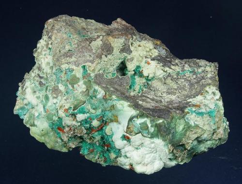 Dioptase with Wulfenite
Mammoth-St. Anthony Mine, Mammoth District, Tiger, Pinal County, Arizona, USA
114 x 82 x 67 mm (Author: GneissWare)