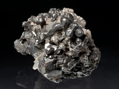Hessite
Botés, Alba Co., Romania
1,6x1,3x1,2 cm
Rounded crystals with Sphalerite and Quartz, from old collection. (Author: Simone Citon)