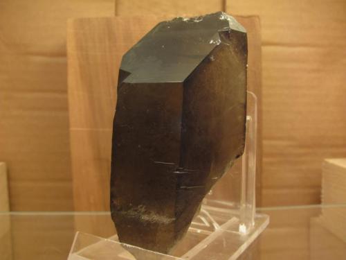 Smoky Quartz
Isle of Arran, Scotland, UK
75mm x 40mm x 33mm
Same specimen as above, showing lessening of depth of colour on right side, due to UV light exposure. (Author: Mike Wood)