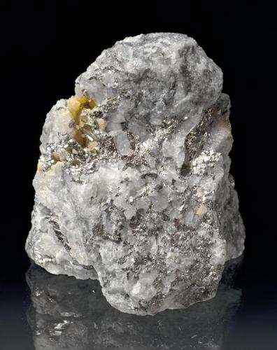 Sylvanite
Cresson Mine, Cripple Creek, Colorado, USA
2,6x2,5x2,2 cm
Steel gray to pale yellowish, flattened, striated crystals in matrix. Unusual rich specimen. (Author: Simone Citon)