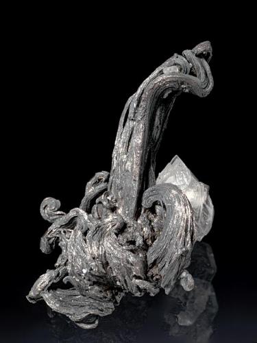 Silver
Himmelsfürst Mine, Brand-Erbisdorf, Freiberg District, Erzgebirge, Saxony, Germany
3,6x2,5x2 cm
Classic wire Silver associated with Calcite, from old collection. (Author: Simone Citon)