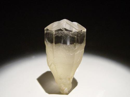 Calcite
Second Sovietskiy Mine, Dalnegorsk, Russia
5.2x2.7cm
Clear and lusterous on the top half with very defined striations on the termination faces. (Author: Greg Lilly)