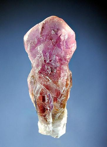 Quartz
Anahi Mine, La Gaiba District, Sandoval Prov., Santa Cruz Dept., Bolivia
3.2 x 8.0 cm.
Partially etched crystal of amethyst with a gemmy interior and zones of yellow citrine. (Author: crosstimber)