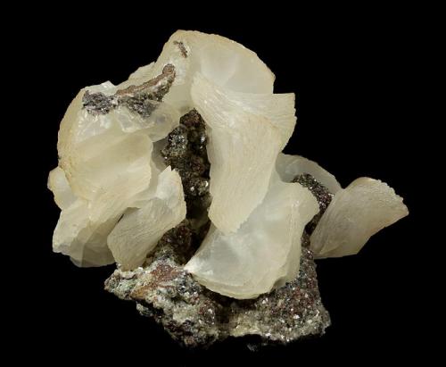 Calcite
Flambeau Mine, near Ladysmith, Rusk County, Wisconsin, USA
81 x 69 x 43 mm

Another view (Author: GneissWare)