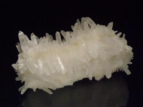 Quartz
Level 8, Komata Reefs Mine, Komata, New Zealand
10.5x5.5cm
A burr of quartz crystals, the top crystals lying flat are double terminated. (Author: Greg Lilly)