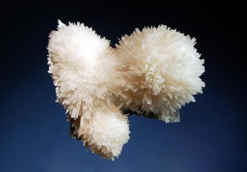 Scolecite
Vambori, Ahmednagar District, Maharashtra, India
5.5 x 7.0 cm.
Spherical growth of bright white scolecite with minor apophyllite-(KF). (Author: crosstimber)