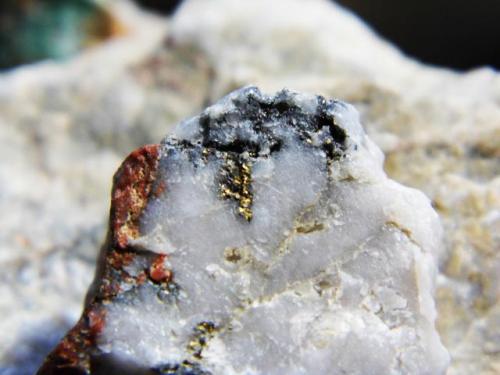 Gold
Wright Hardgraves, Kirkland Lake, Ontario, Canada
3.2 x 3 cm

Gold in molly and quartz (Author: derrick)