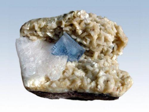 Fluorite
Florence Mine, Egremont, Cumbria, England, |UK
Blue 25mm fluorite crystal with baryte, on dolomite. (Author: ian jones)