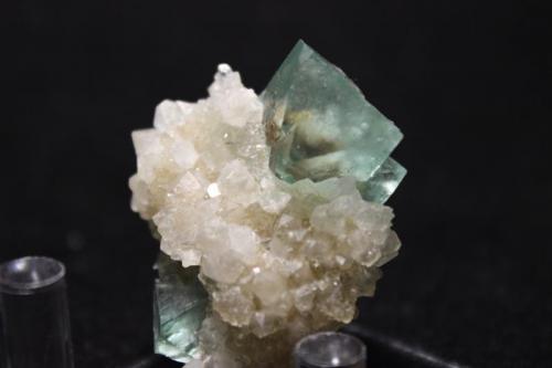 Fluorite, Hematite
Riemvasmaak, Northern Cape Province, South Africa
4.4 x 3.3 x 2.2 cm
Fluorite with hematite inclusions (Author: Don Lum)
