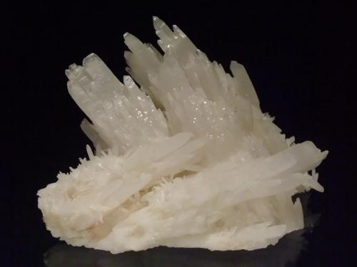 Quartz
Tararu Creek, Thames, New Zealand
12x8cm
A cluster of quartz crystals, the crystals standing up at the back quite flattened. 
Collected by George Judge ex Arline Broad collection (Author: Greg Lilly)