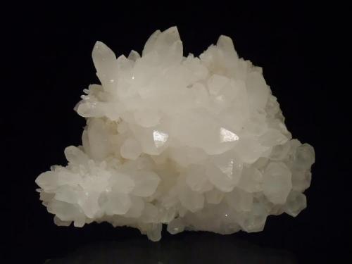 Quartz
Kaimarama Stream, Whitianga, New Zealand
9x7cm
Cluster of milky quartz crystals to approx 2cm. (Author: Greg Lilly)