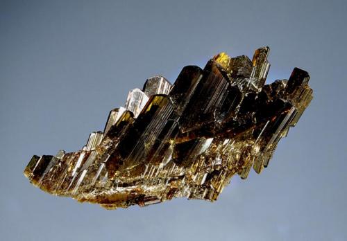 Epidote
Tormiq, Haramosh Mts., Skardu District, Gilgit-Baltistan, Pakistan
3.0 x 5.9 cm.
A sub-parallel group of glassy olive green epidote crystals with no point of attachment. (Author: crosstimber)