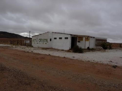 Just 5 km from Blesberg (close to the Namibia border) is the entrance to another mine, Swartberg.  The building in the picture was a little roadside shop.  When the owner, who also sold minerals, died the place closed down and was plundered. (Author: Pierre Joubert)