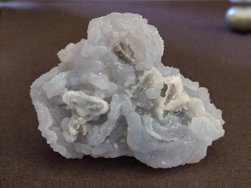 Chalcedony
9th Septemvri mine (Deveti Septemvri mine), Madan ore field, Rhodope Mts, Smolyan Oblast, Bulgaria
4.4 x 3.4 cm (Author: nurbo)