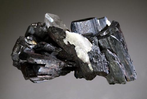 Ferberite
Shigar Valley, Skardu District, Gilgit-Baltistan, Pakistan
3.5 x 7.1 cm.
Semi-lustrous black ferberite crystals to 2.5 cm forming am intergrown cluster with quartz. (Author: crosstimber)