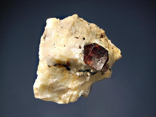 Zircon
Bulbin, Astor District, Gilgit-Baltistan, Pakistan
3.0 x 4.0 cm
Dark brown prismatic zircon exhibiting reddish highlights in strong transmitted light. (Author: crosstimber)